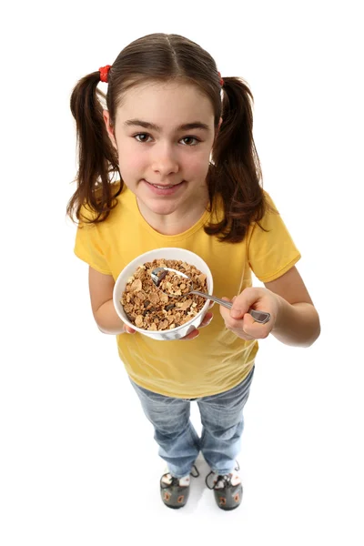 Girl holding bowl of muesli — Stock Photo, Image