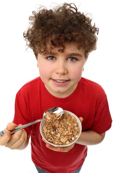 Junge hält Müsli in der Hand — Stockfoto