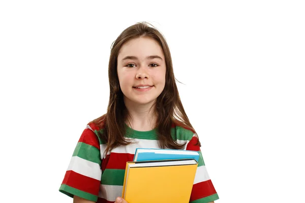 Menina segurando livros — Fotografia de Stock