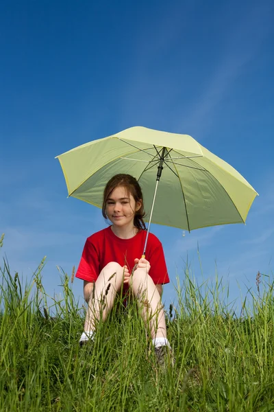 Girl sitting with umbrella — Stock Photo, Image