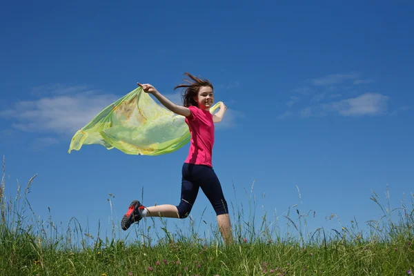 Young girl jumping outdoor — Stock Photo, Image