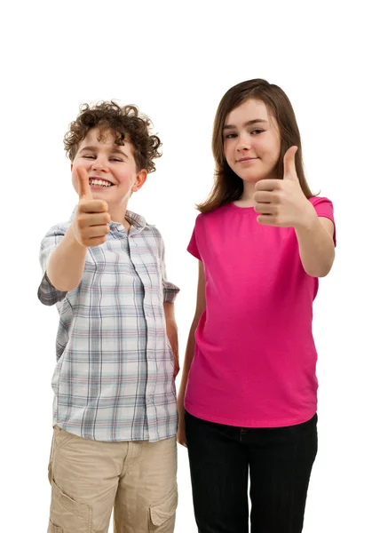 Menino e menina mostrando polegares para cima sinal — Fotografia de Stock
