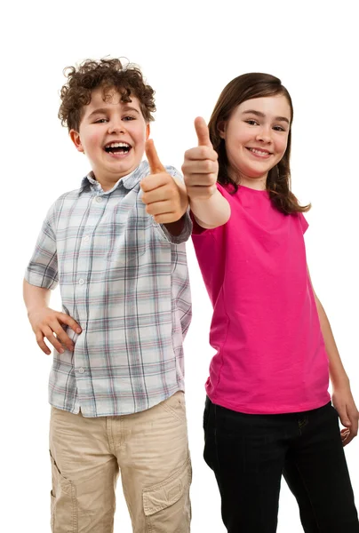 Menino e menina mostrando polegares para cima sinal — Fotografia de Stock