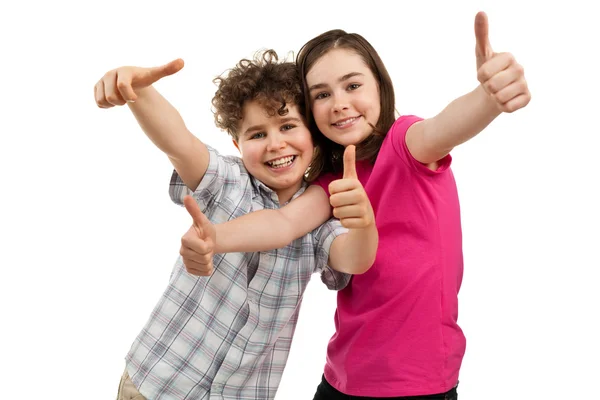 Junge und Mädchen mit erhobenen Daumen — Stockfoto