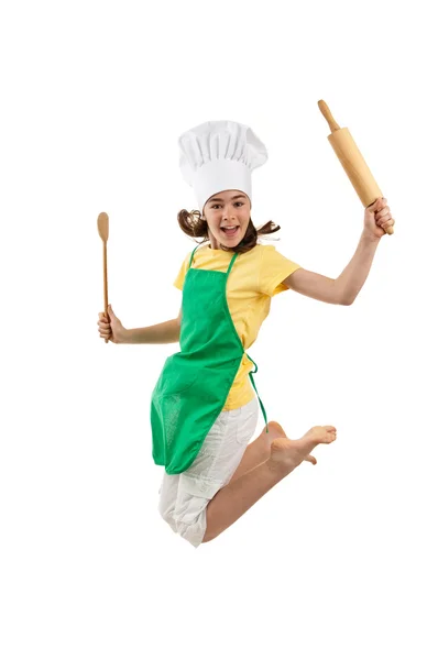 Menina pulando com utensílios de cozinha — Fotografia de Stock