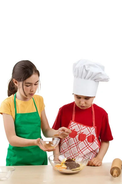 Kids mixing dough — Stock Photo, Image