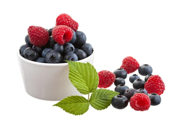 Raspberries and blueberries — Stock Photo, Image