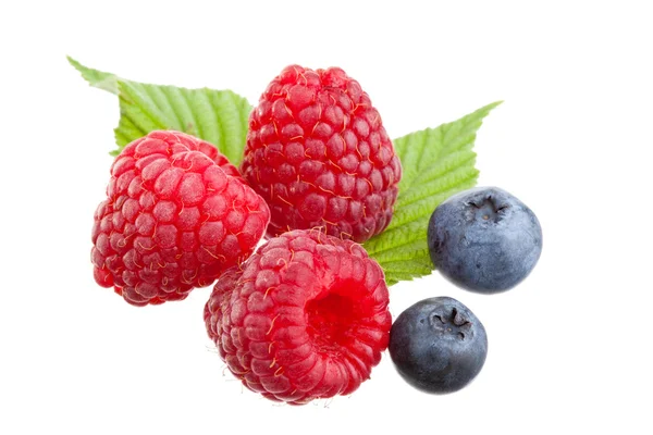 Raspberries and blueberries — Stock Photo, Image