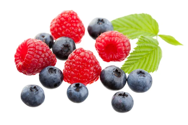 Raspberries and blueberries — Stock Photo, Image