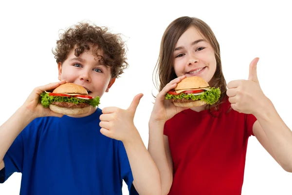 Kids eating healthy sandwiches — Stock Photo, Image