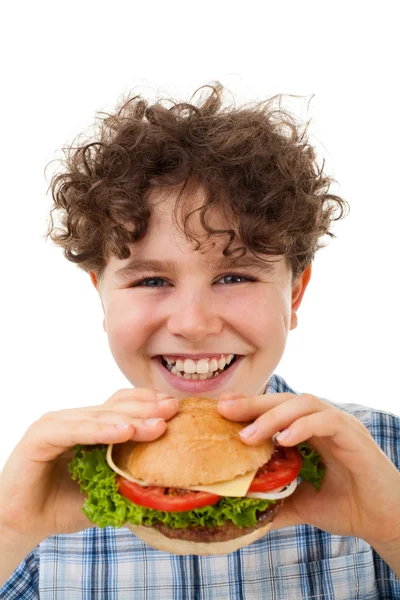 少年はサンドイッチを食べて — ストック写真