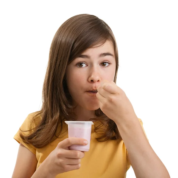 Pige spiser yoghurt - Stock-foto