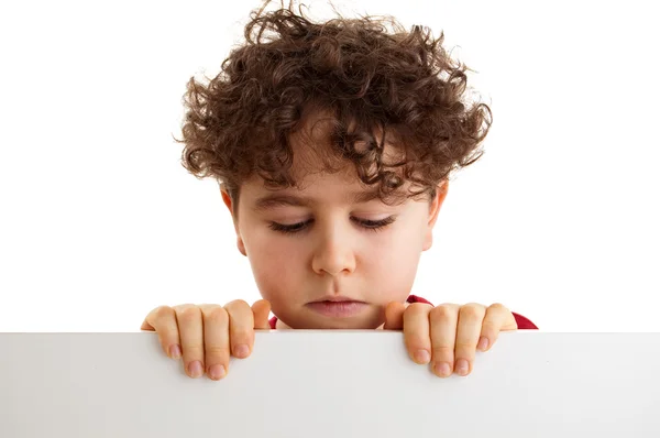 Boy holding empty board — Stock Photo, Image