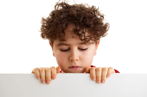 Jongen bedrijf leeg bord — Stockfoto