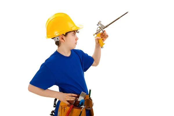 Мальчик-строитель — стоковое фото