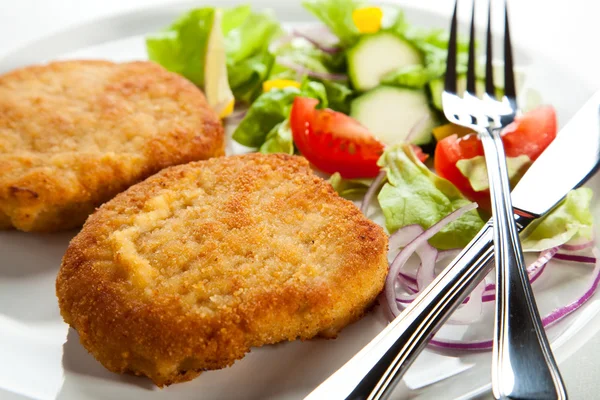 Fried chop pork and vegetable salad — Stock Photo, Image