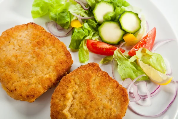 Fried chop pork and vegetable salad — Stock Photo, Image