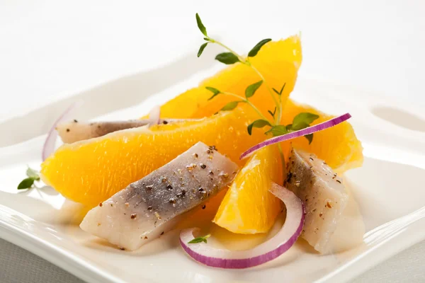 Filetes de arenque con naranja —  Fotos de Stock