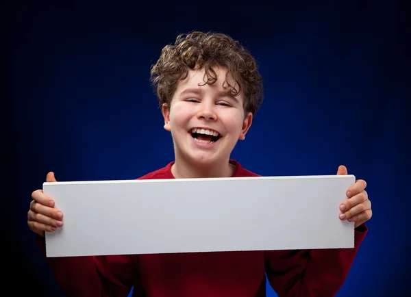 Menino com placa em branco — Fotografia de Stock