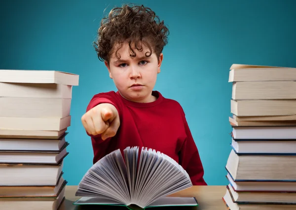 Curly boy learning at home — Stock Photo, Image