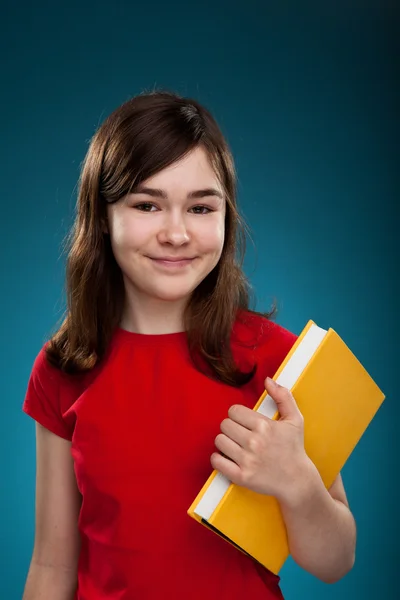 Girl holding book — Stock Photo, Image