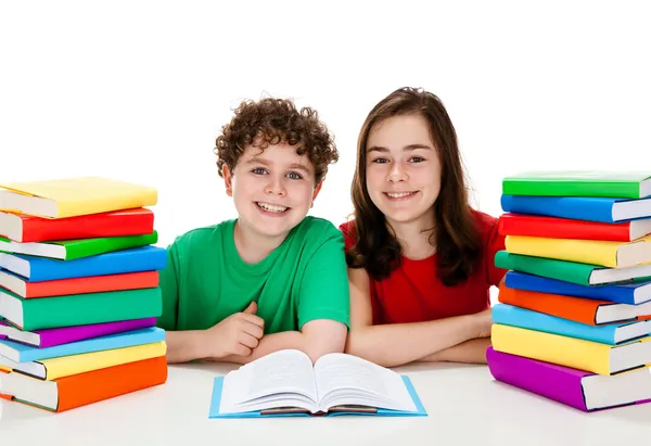 Kids and pile of books — Stock Photo, Image