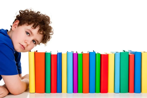 Student with pile of books — Stock Photo, Image