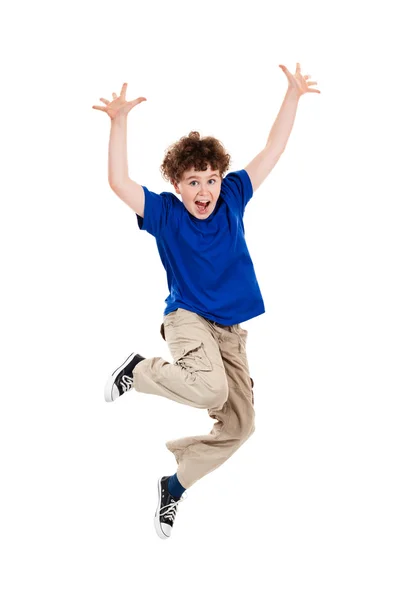 Poika hyppii — kuvapankkivalokuva