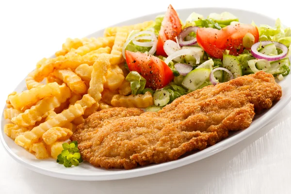 Fried pork, chop French fries and vegetables — Stock Photo, Image