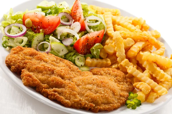 Fried pork, chop French fries and vegetables — Stock Photo, Image