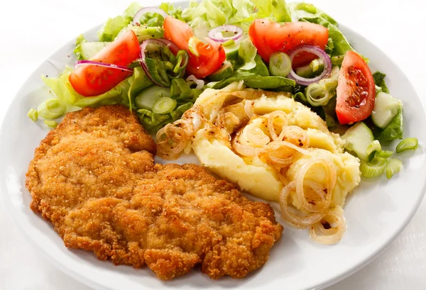 Pork chops, mashed potatoes and vegetable salad — Stock Photo, Image