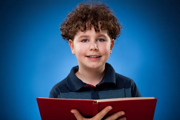 Boy reading book — Stock Photo, Image