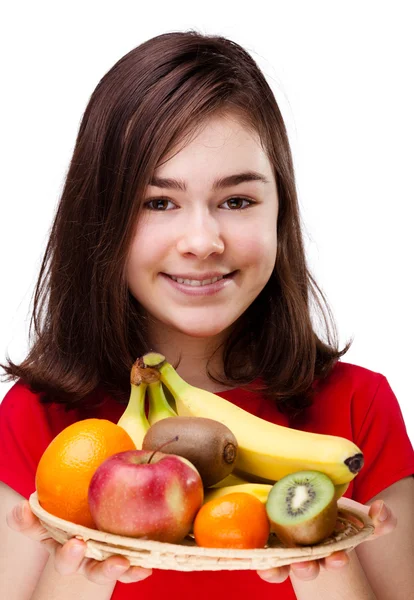 Meisje bedrijf vruchten — Stockfoto