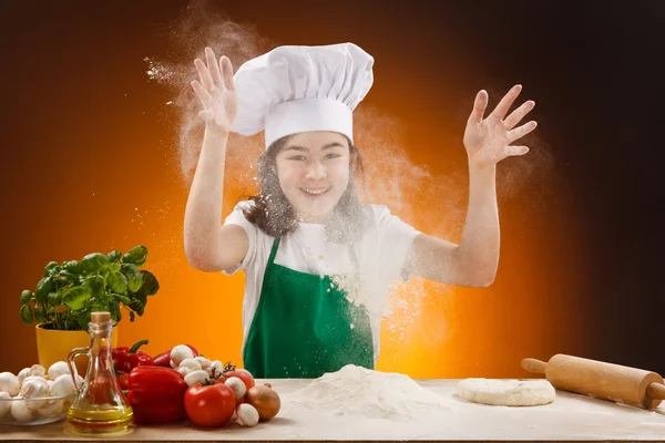 Girl making pizza dough — Stock Photo, Image