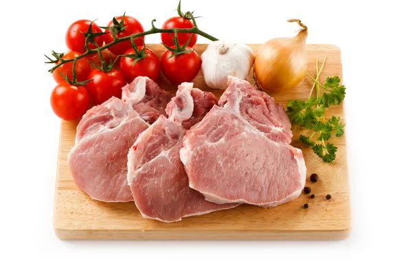 Raw pork on cutting board — Stock Photo, Image