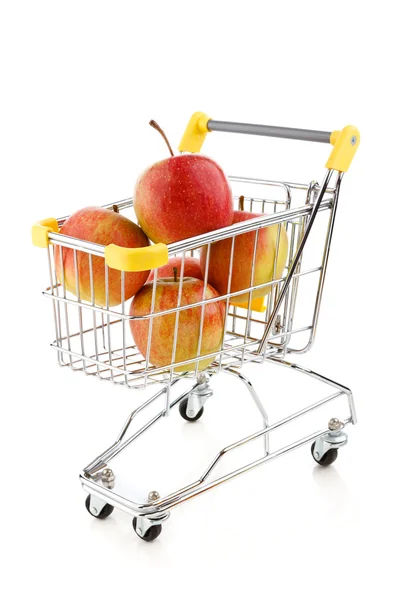 Shopping trolley full of apples — Stock Photo, Image