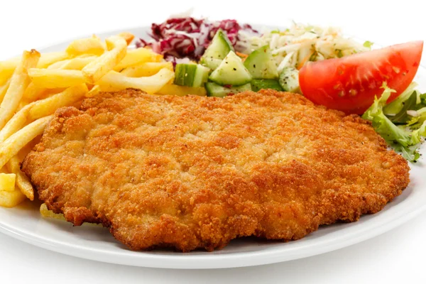 Fried pork chop French fries and vegetables — Stock Photo, Image