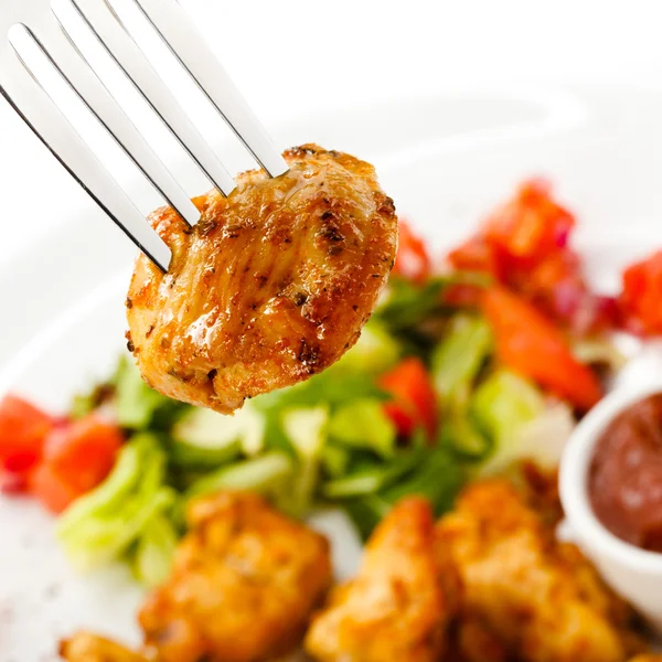 Grilled meat with sauce and vegetables — Stock Photo, Image