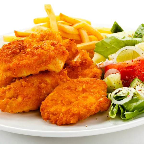 Grilled meat, french fries and vegetables — Stock Photo, Image