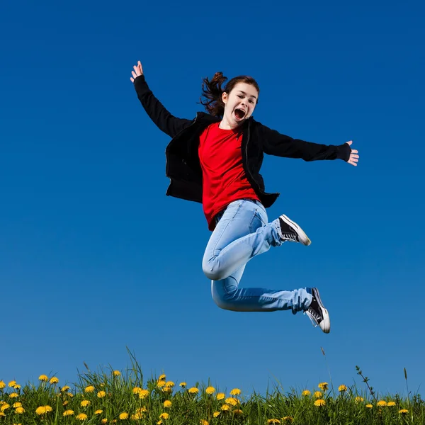 Jumping lány — Stock Fotó