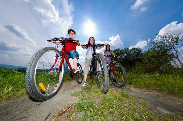 Active family biking — Stock Photo, Image