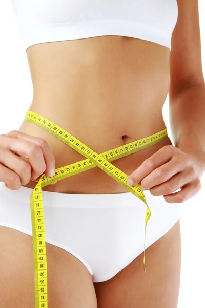 Mulher medindo seu corpo magro — Fotografia de Stock