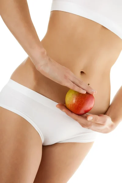 Slim woman with apple — Stock Photo, Image