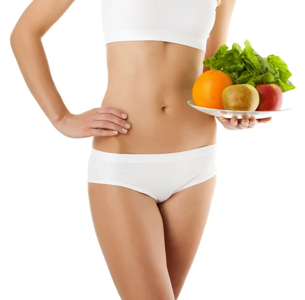 Donna magra con frutta — Foto Stock