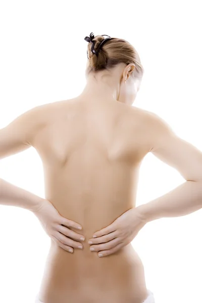 Woman massaging pain back — Stock Photo, Image