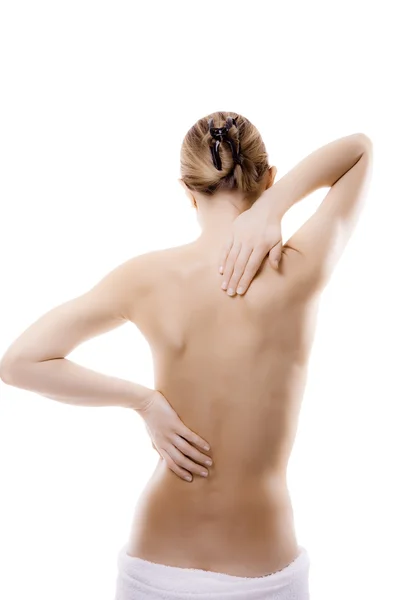 Žena masážní bolesti zpět — Stock fotografie