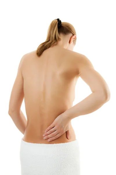 Mujer masajeando dolor de espalda — Foto de Stock