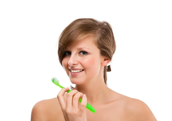 Woman brushing teeth — Stock Photo, Image