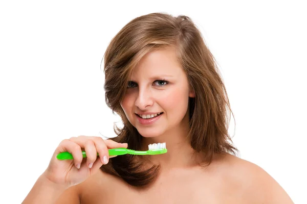 Woman brushing teeth — Stock Photo, Image