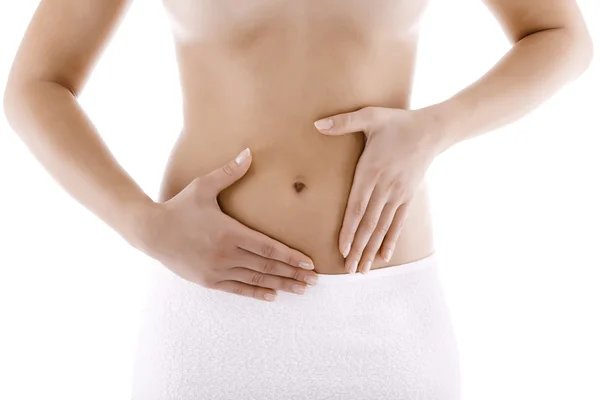 Mujer delgada masajeando abdomen —  Fotos de Stock